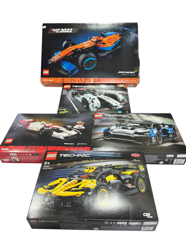 Five boxed Lego Racing Car construction kits, model numbers 42151, 10330, 42123, 42137 and 42141. *Lot sold as seen, contents not guaranteed, all boxes have been opened then re-sealed, no Condition Reports available on this Lot*