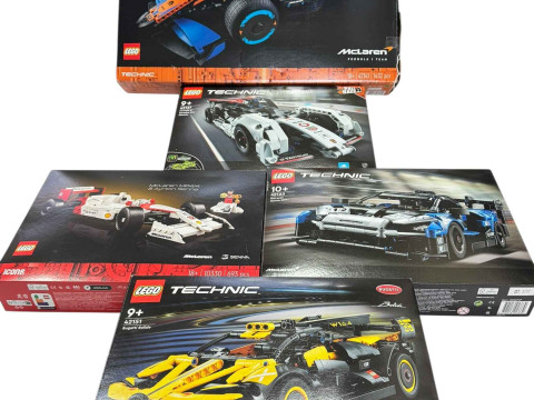 Five boxed Lego Racing Car construction kits, model numbers 42151, 10330,...