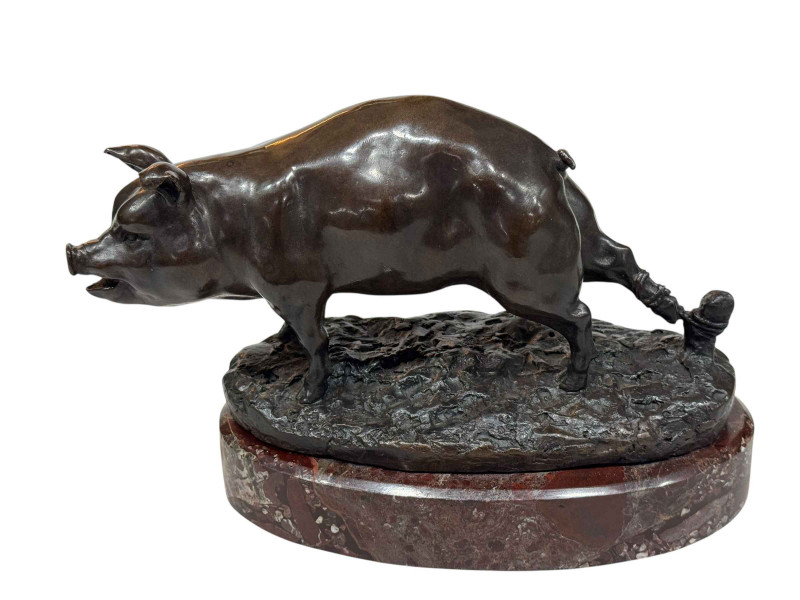 Bronze figure of a tethered pig on marble base.