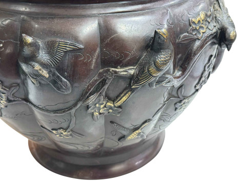 Large Japanese bronze jardiniere decorated with raised bird and foliage, 28cm high by 40cm deep. thumbnail