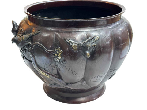 Large Japanese bronze jardiniere decorated with raised bird and foliage, 28cm high by 40cm deep. thumbnail