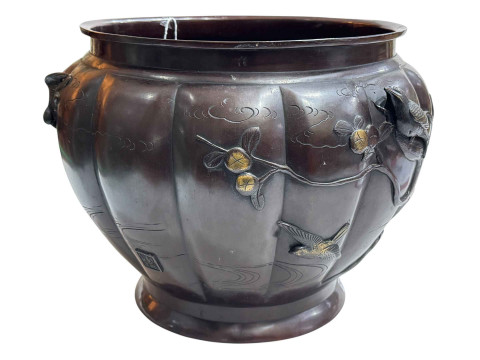 Large Japanese bronze jardiniere decorated with raised bird and foliage, 28cm high by 40cm deep. thumbnail