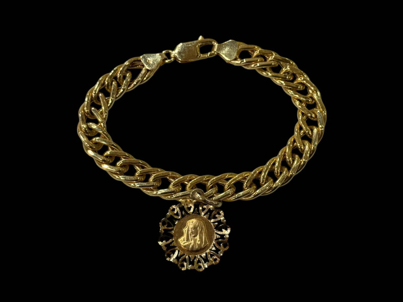 9 carat gold chain link bracelet with Mary medallion.