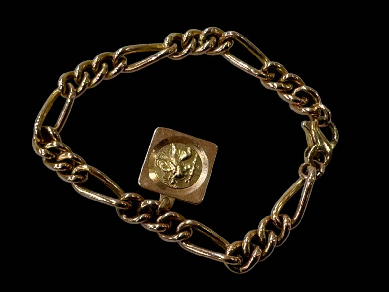 9 carat gold link bracelet with St Christopher.