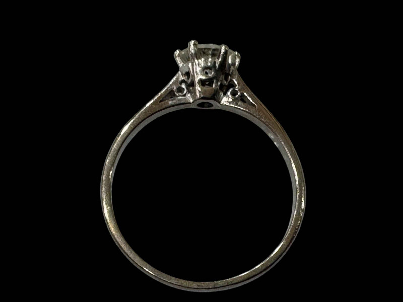 Diamond solitaire ring, approximately 0.75 carat, claw set in 18 carat white gold and platinum, size N.