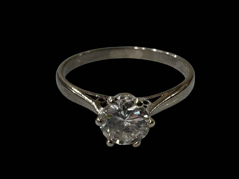 Diamond solitaire ring, approximately 0.75 carat, claw set in 18 carat white gold and platinum, size N.
