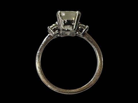 Sapphire and diamond 18 carat white gold ring, having cushion light yellow sapphire flanked by brilliant cut diamonds, sapphire approximately 1.5 carat, diamond total approximately 0.45, size L/M. thumbnail