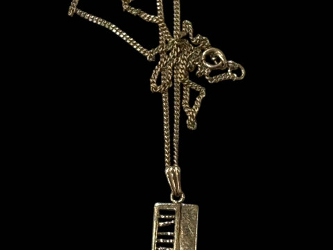 Diamond set 9 carat gold pendant with chain.