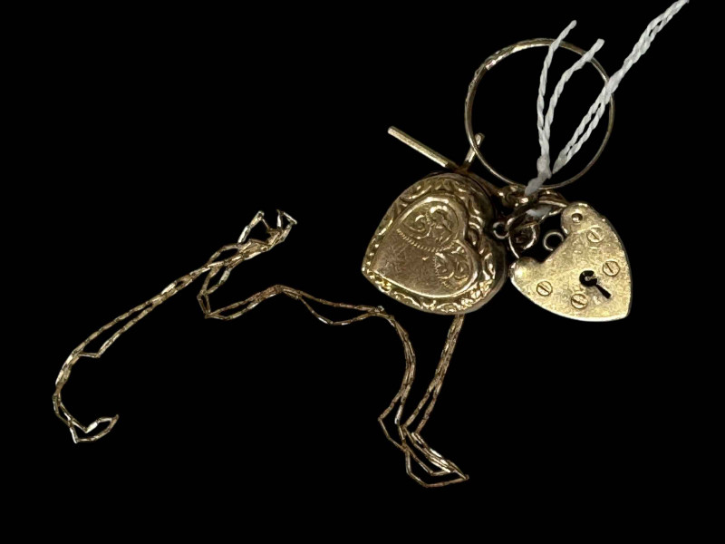 9 carat gold ring, cross, chain and padlock fastener, and, gold back and front locket(5).