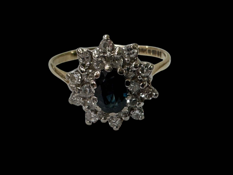 Sapphire and diamond cluster 9 carat gold ring, size N.