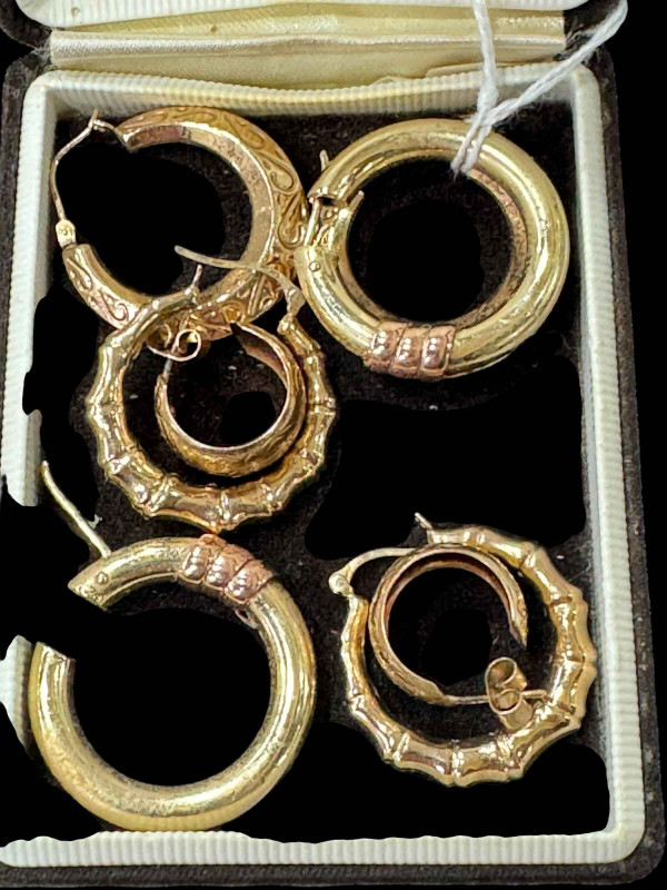 Four pairs of 9 carat gold earrings.