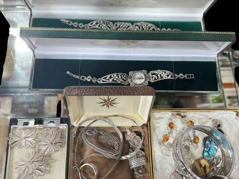 Collection of mostly silver jewellery including large buckle bangle.