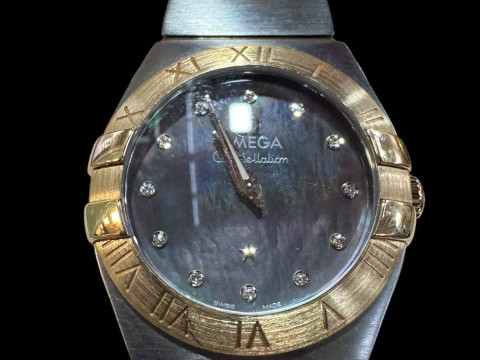 Good ladies Omega Constellation quartz watch in stainless steel and 18 carat yellow gold with mother of pearl diamond set dial, in little used condition and with box, papers and travel case, serviced in 2021 at a cost of £450. thumbnail
