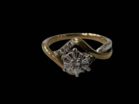 9 carat yellow and white gold twist design diamond ring, size M.