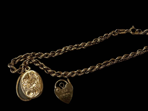 9 carat gold link bracelet, locket and padlock.