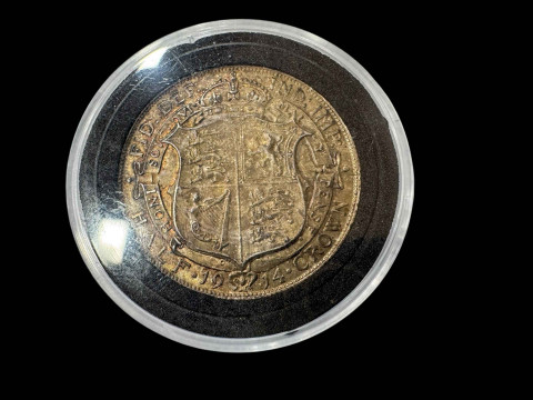 1914 uncirculated silver half crown.