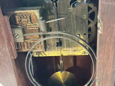 Edwardian inlaid mahogany balloon mantel clock with brass handles and bun feet. thumbnail