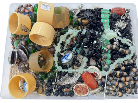 Collection of costume jewellery, napkin rings, etc.