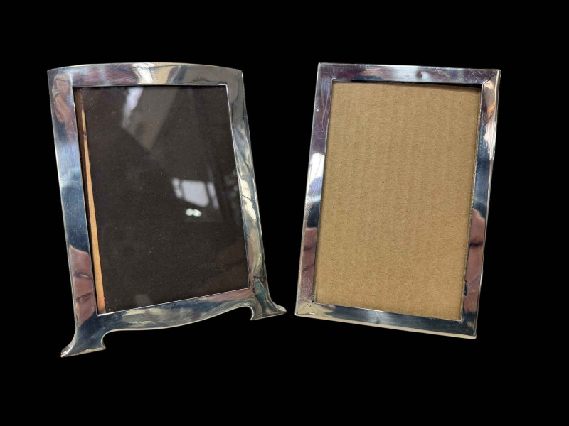 Two silver mounted easel photograph frames, Birmingham 1918 and 1922, both approximately 15cm by 10cm.