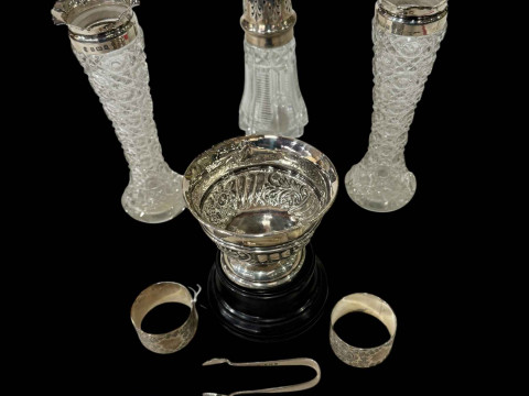 Silver embossed bowl with plinth, pair Victorian silver napkin rings,...