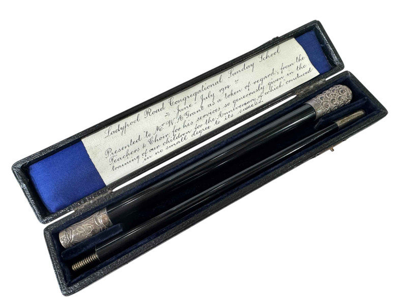 Silver mounted ebony presentation baton, London 1910, cased.
