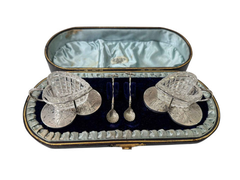 Pair cased Victorian trefoil silver and heart shaped glass salts and spoons,...
