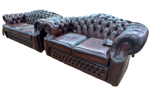 Pair Antique Chestnut leather deep buttoned and studded three seater and two seater Chesterfield settees. thumbnail
