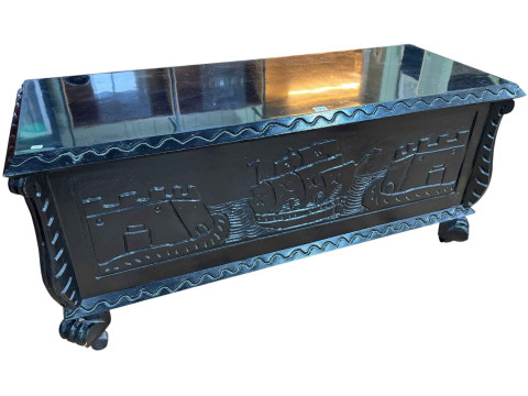Black lacquered galleon decorated coffer, 59cm by 127cm by 49cm.