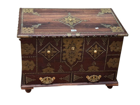 Teak and brass mounted trunk having two base drawers enclosing secret...