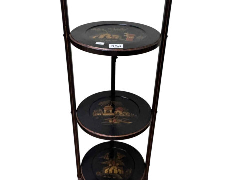 Chinoiserie lacquered three tier folding cakestand, 86cm by 27cm.