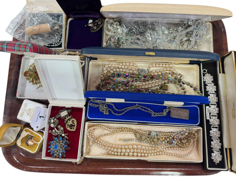 Collection of costume jewellery including silver ingot on chain, cameo...