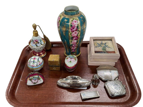 Silver compact vesta, salt pot, money clip and nail buff, four trinket...