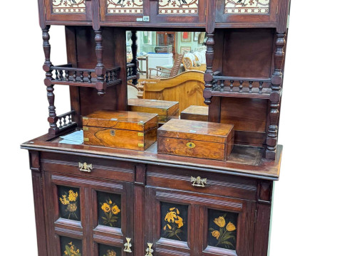 Late Victorian aesthetic mirror backed cabinet having four canopy doors...