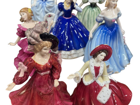 Seven Doulton figures including three Figures of the Year.