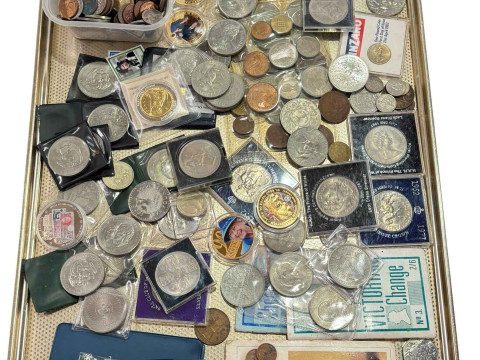 Collection of coins and tokens.