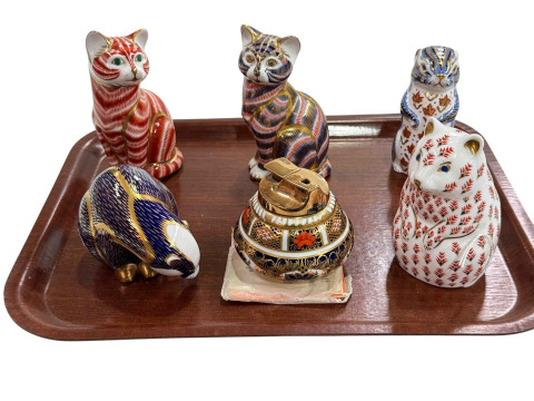 Royal Crown Derby Imari pattern table lighter and five paperweights.