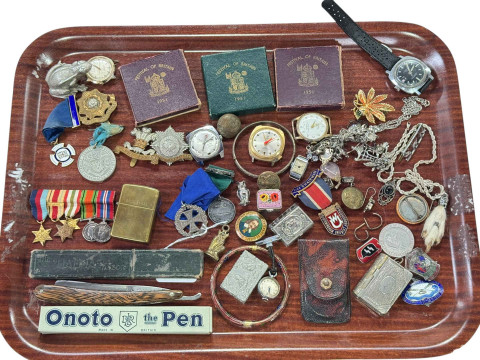 Tray of collectables including watches, badges, mini medals, lighters,...