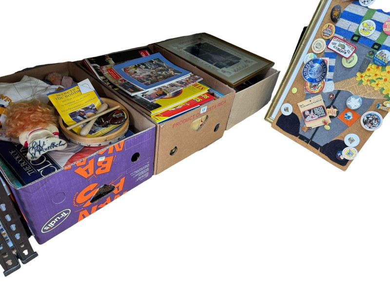 Eight boxes and two suitcases of circus related ephemera, badges and collectables.