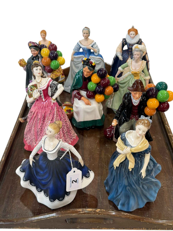 Four Franklin Mint figures including Elizabeth I and Marie Antoinette and six Royal Doulton figures including Biddy Penny Farthing and Carmen.