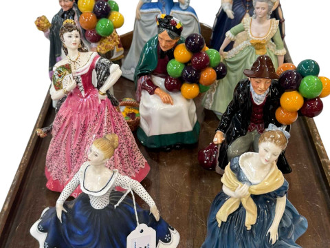 Four Franklin Mint figures including Elizabeth I and Marie Antoinette...
