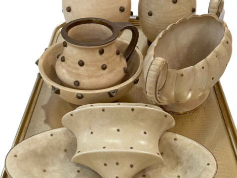 Seven pieces of Bursley Ware Charlotte Rhead Polka Dot pottery including...