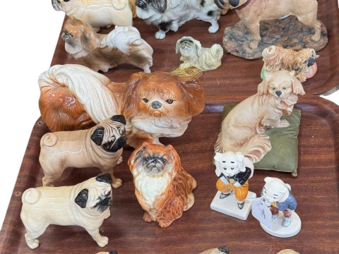 Collection of dog ornaments including Beswick Pugs, Goebel Pekinese, Border...