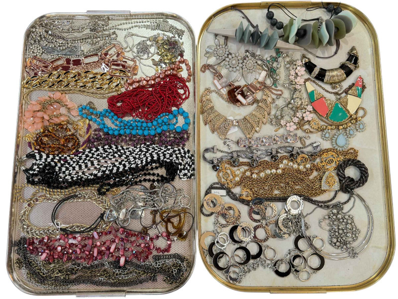 Two trays of assorted dress jewellery including Rochas Paris, Newbridge bracelet, etc.