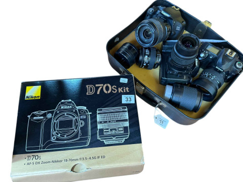Nikon D70 & D50 cameras, Canon EOS550D camera, two Nikon and Canon lenses.