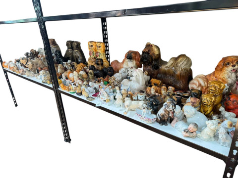 Large collection of dog ornaments including Pugs and Pekinese.