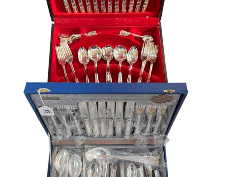 Two canteens of cutlery by Oneida and Cooper Ludlum.