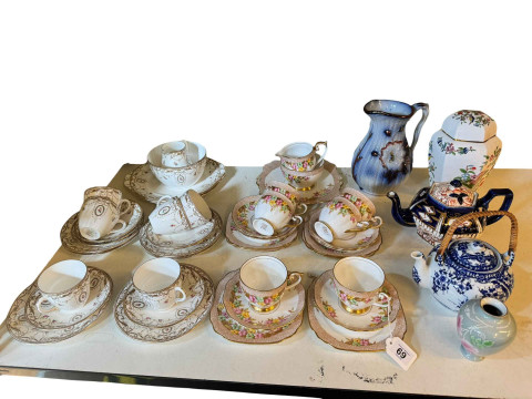 Two half tea sets, Shelley and Bell china, and teapots, etc.