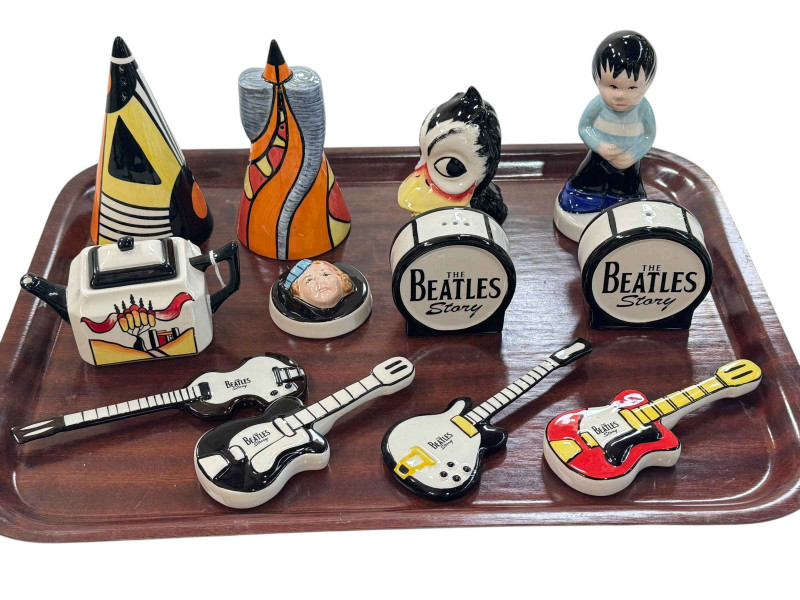 Collection of Lorna Bailey pottery including The Beatles Story salt and pepper, and four guitars, Mayfield teapot, two sifters, figure and duck.