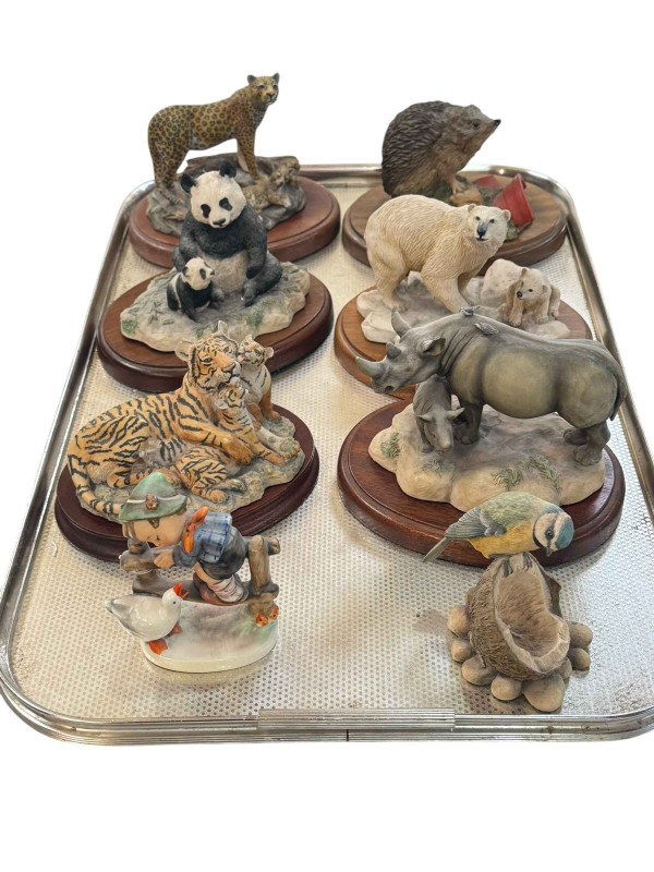 Six animal sculptures including Border Fine Arts, Border Fine Arts Blue Tit and Hummel figure.