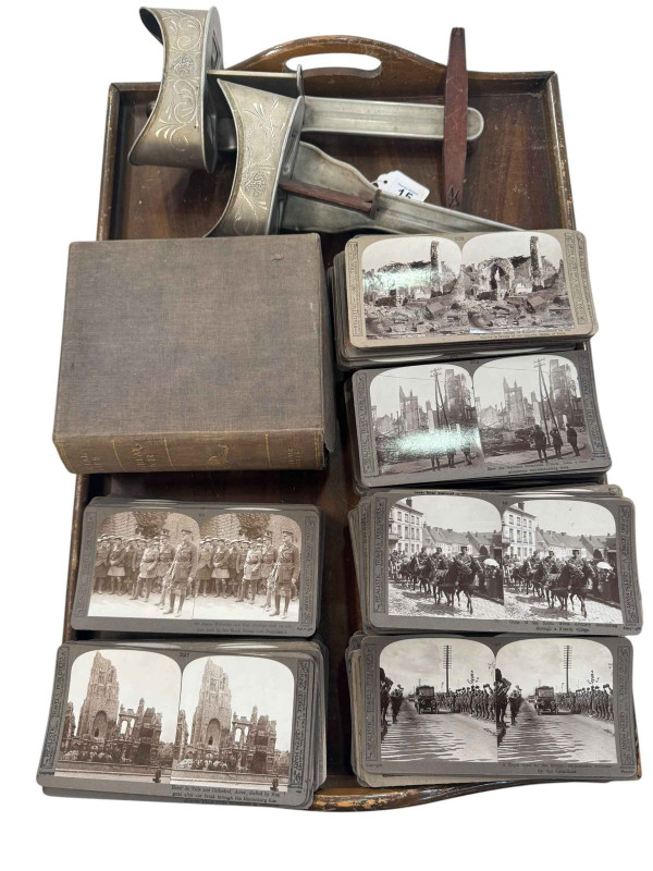 Two Stereoscopic viewers and a good collection of cards including some from WWI 'The Great War Series'.